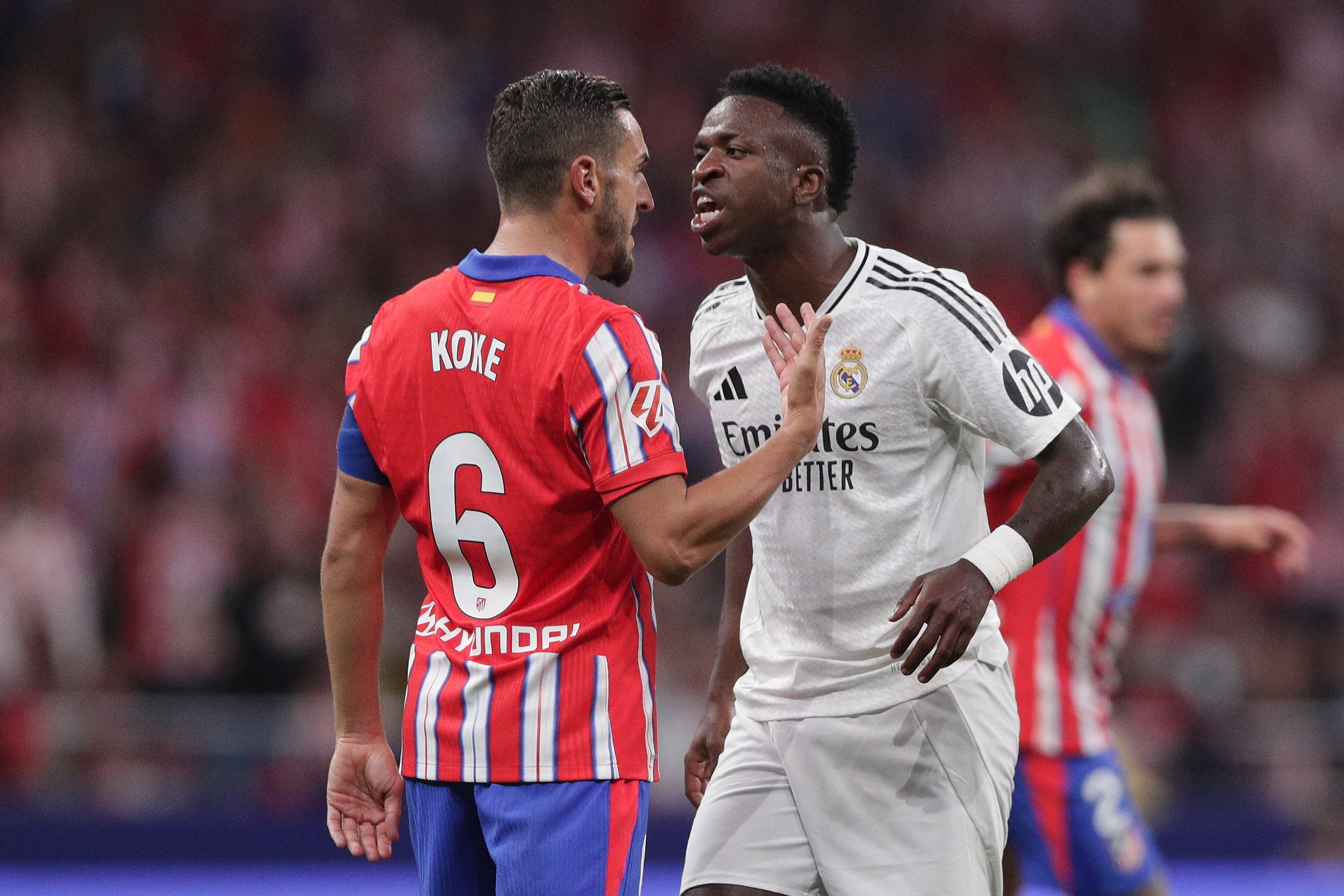 Koke y  Vinicius Junior