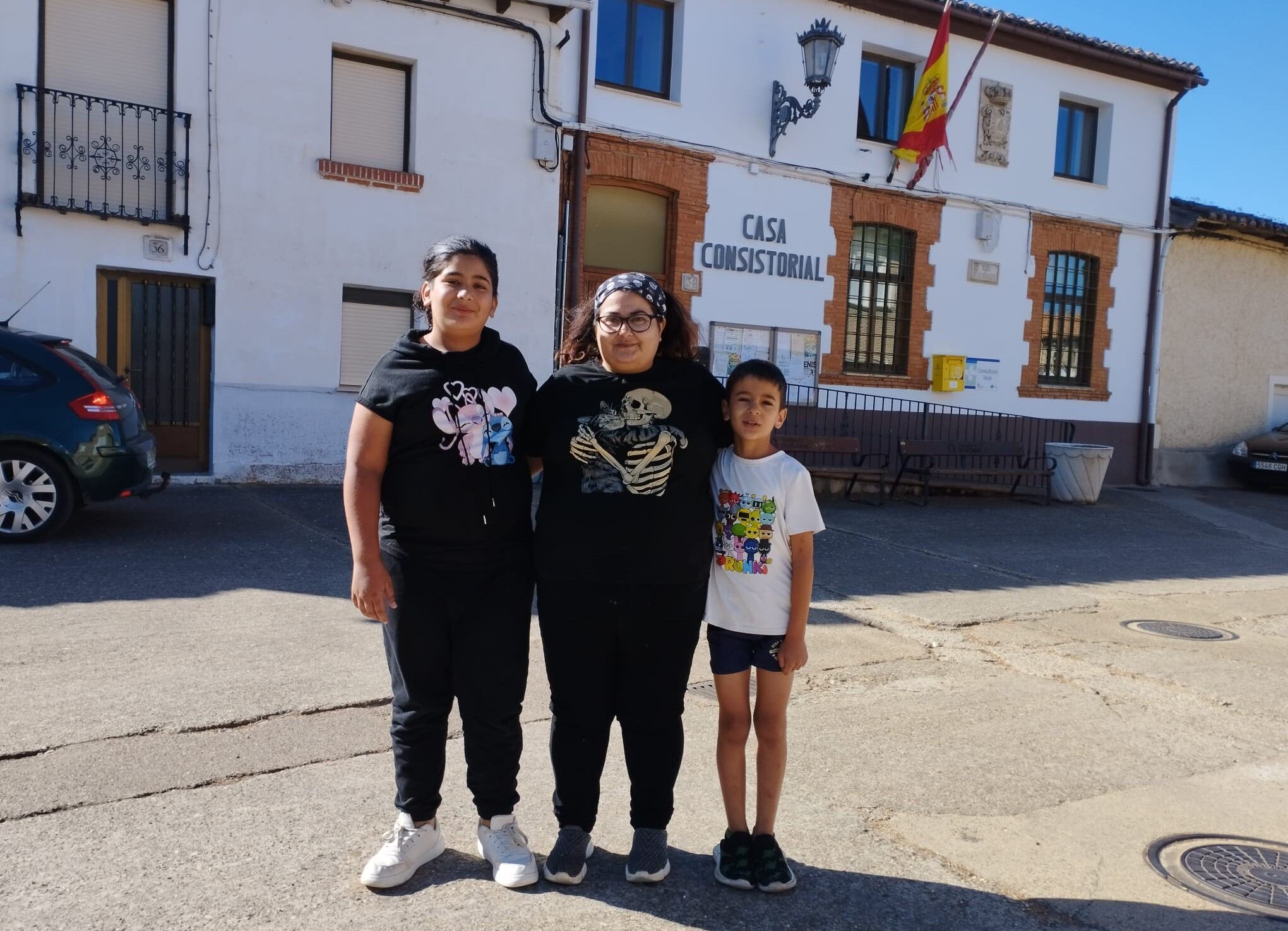 Silvia Fernández y sus dos hijos