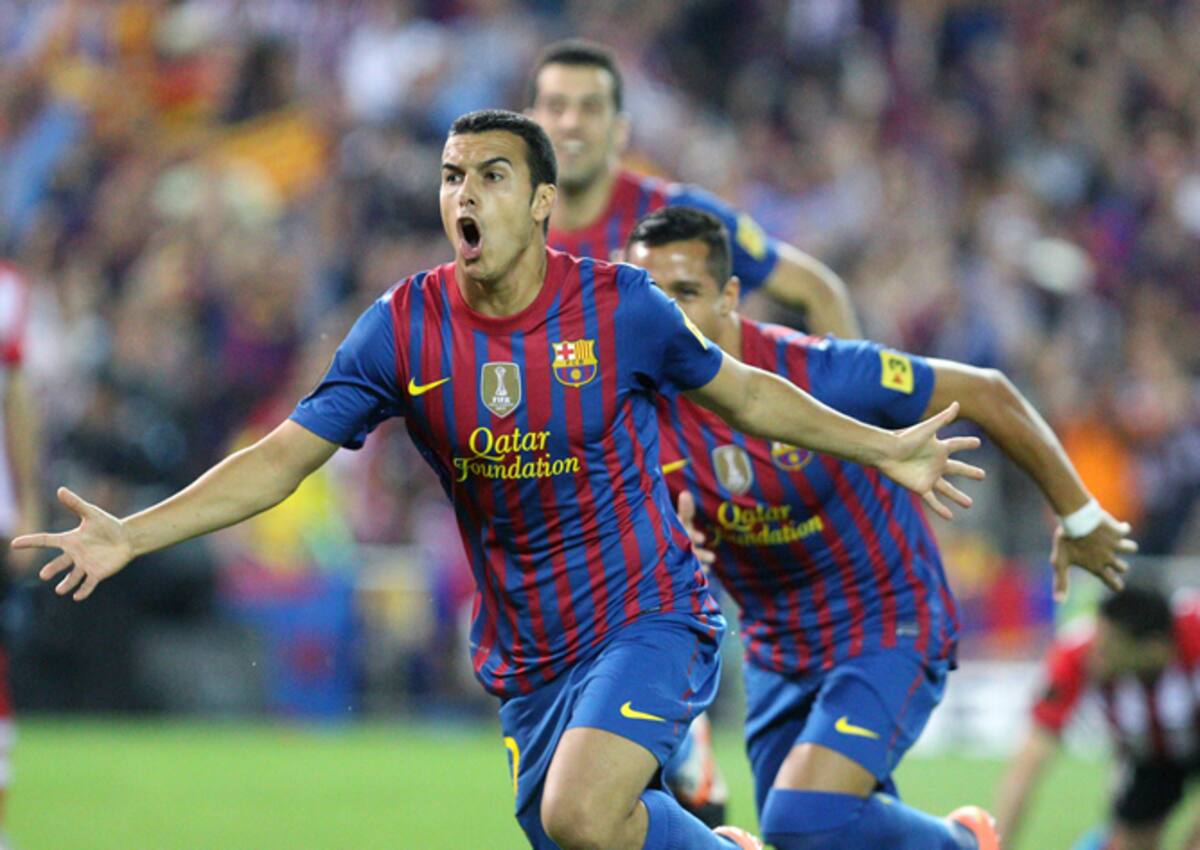 El delantero del FC Barcelona Pedro Rodríguez celebra la consecución del primer gol de su equipo ante el Athletic Club, en la final de la Copa del Rey de fútbol que se disputa esta noche en el estadio Vicente Calderón de Madrid. | <a href="http://goo.gl/g