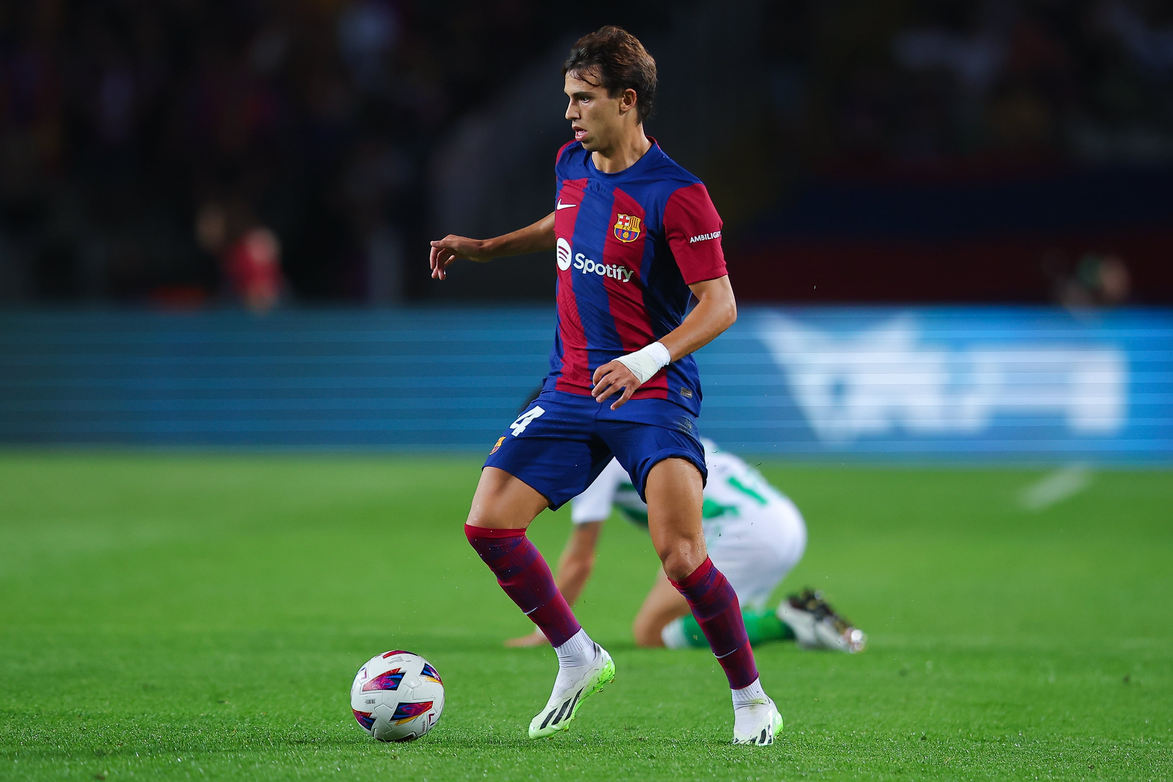 BARCELONA, SPAIN - SEPTEMBER 16: Joao Felix of FC Barcelona run with the ball during the LaLiga EA Sports match between FC Barcelona and Real Betis at Estadi Olimpic Lluis Companys on September 16, 2023 in Barcelona, Spain. (Photo by Eric Alonso/Getty Images)