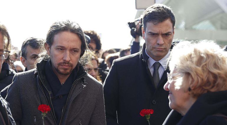 El secretario general del PSOE, Pedro Sánchez, y el líder de Podemos, Pablo Iglesias, durante el homenaje a las víctimas de los atentados del 11 de marzo de 2004.