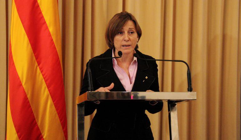 La presidenta del Parlament, Carme Forcadell, en el momento de anunciar a Artur Mas como candidato a la presidencia de la Generalitat