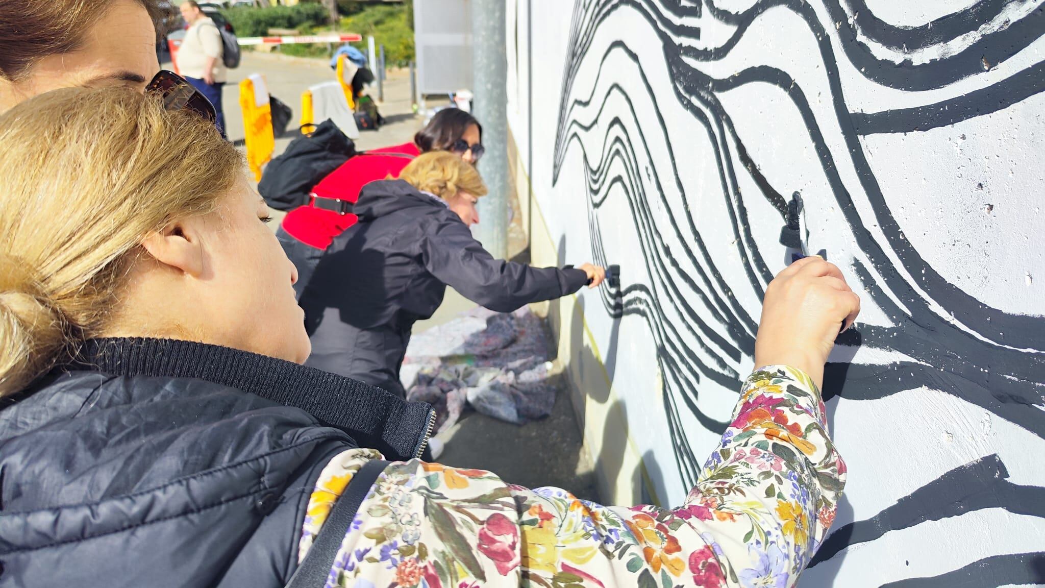 Participants en la proposta de la Càtedra d'Innovació Social en aquest Dia Internacional de la Felicitat que s'han atrevit a "pintar" un concepte tan abstracte i, alhora, tan quotidià com la felicitat.