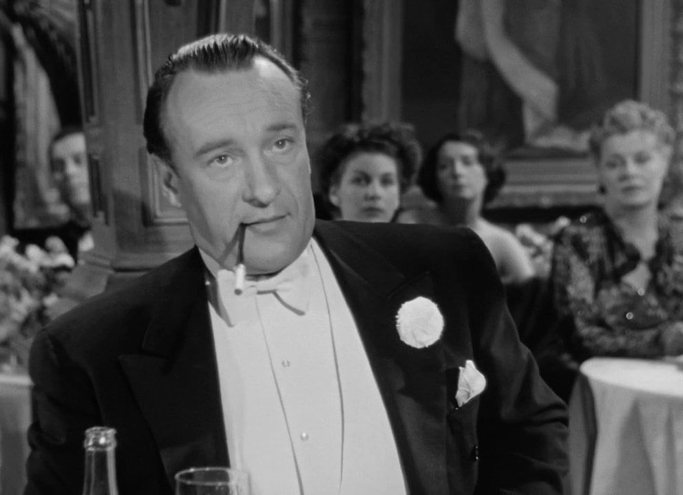 George Sanders en una escena de Eva al desnudo