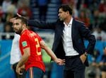 FILE PHOTO: Soccer Football - World Cup - Group B - Spain vs Morocco - Kaliningrad Stadium, Kaliningrad, Russia - June 25, 2018 Spain coach Fernando Hierro gestures next to Dani Carvajal REUTERS/Gonzalo Fuentes/File Photo