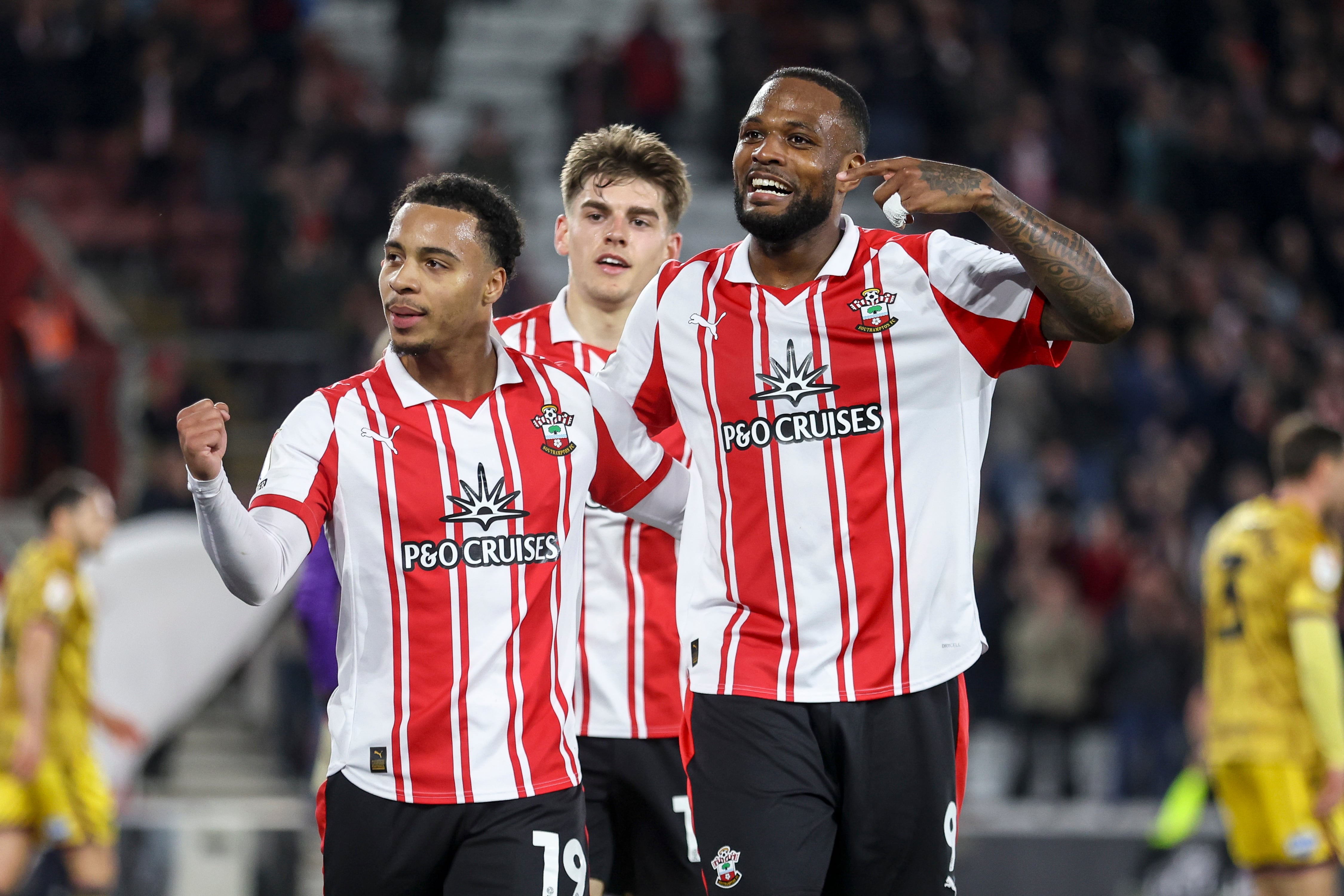 SOUTHAMPTON, ENGLAND - APRIL 14: Cyle Larin0 of Southampton celebrates after he scores a goal to make it 1-0 with team-mate Cameron Archer during the Sky Bet Championship match between Southampton and Blackburn Rovers at St Mary's Stadium on April 14, 2026 in Southampton, England. (Photo by Robin Jones/Getty Images)