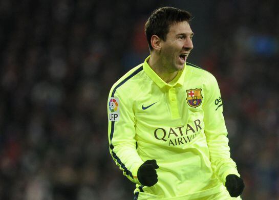 Barcelona&#039;s Argentinian forward Lionel Messi celebrates after scoring during the Spanish league football match Athletic Club Bilbao vs FC Barcelona at the San Mames stadium in Bilbao on February 8, 2015. Barcelona won 5-2. AFP PHOTO/ ANDER GILLENEA