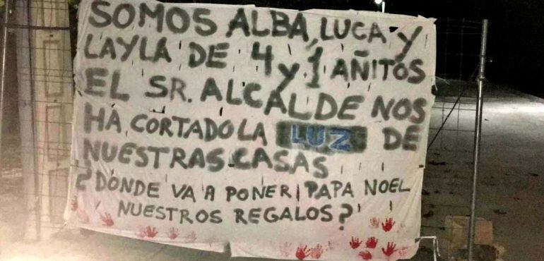 Pancarta con la vecinal de los propietarios