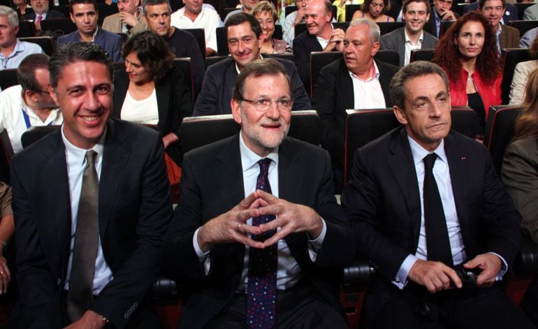 Xavier García Albiol, junto a Mariano Rajoy y Nicolas Sarkozy en el cierre de campaña del PP catalán