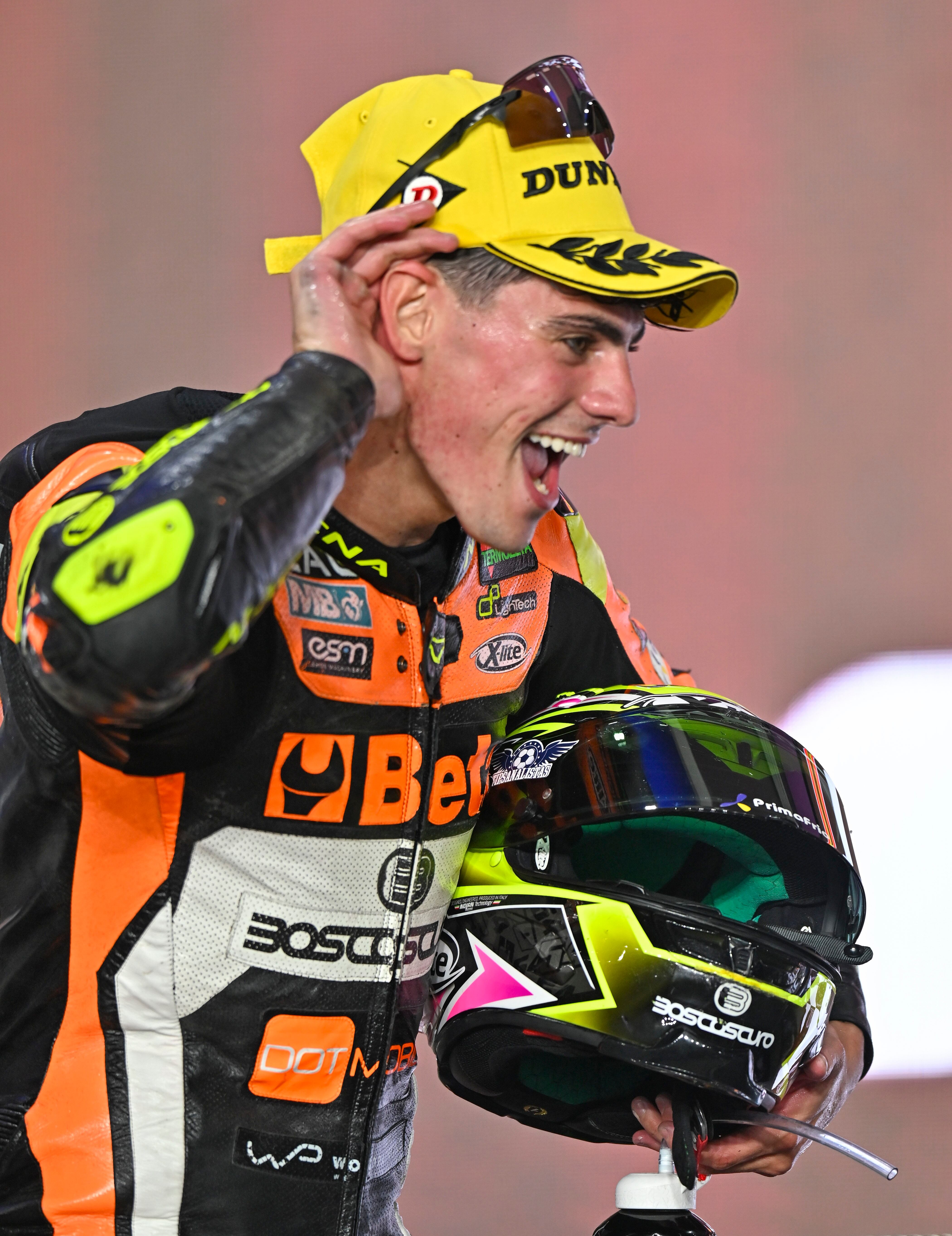 Doha (Qatar), 19/11/2023.- First placed Spanish rider Fermin Aldeguer of GT Trevisan SpeedUp celebrates on the podium after the Moto2 race of the Motorcycling Grand Prix of Qatar at the Losail International Circuit in Doha, Qatar, 19 November 2023. (Motociclismo, Ciclismo, Catar) EFE/EPA/NOUSHAD THEKKAYIL
