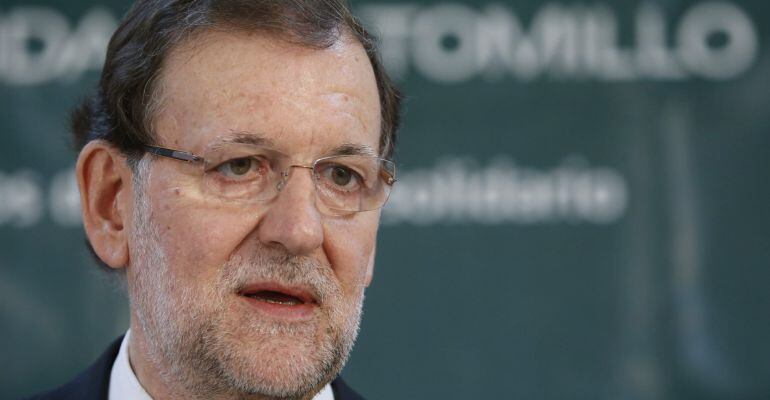 GRA089. MADRID, 23/07/2015.- El presidente del Gobierno, Mariano Rajoy, durante su intervención en la visita que han realizado hoy a a la Fundación Tomillo del madrileño barrio de Orcasitas. EFE/Ángel Díaz ***POOL***