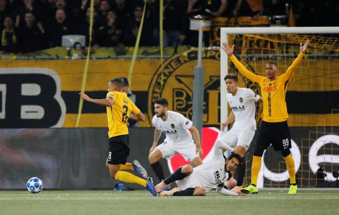 Soccer Football - Champions League - Group Stage - Group H - BSC Young Boys v Valencia - Stade de Suisse, Bern, Switzerland - October 23, 2018  Young Boys are awarded a penalty by referee Andris Treimanis after Young Boys&#039; Djibril Sow is fouled by Valenci