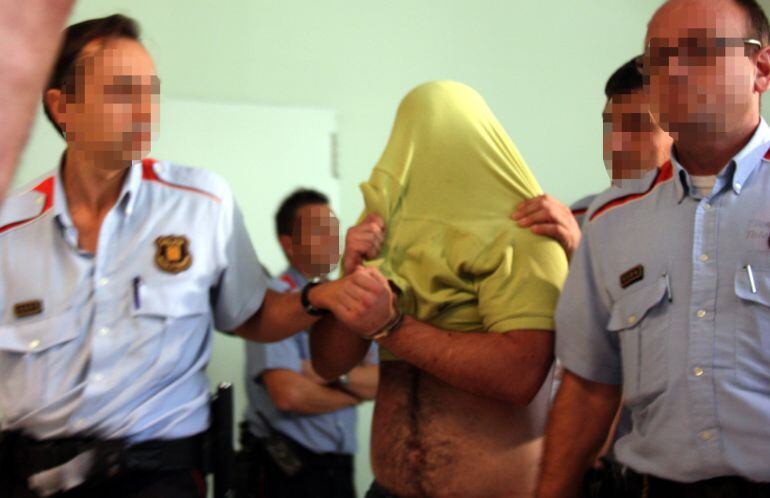 Imatge de l'acusat, passant a disposició judicial el 26 de setembre de 2014.