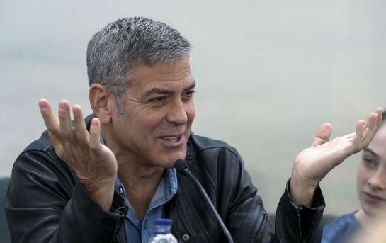 US actor George Clooney gestures during a press conference presenting his latest film &#039;Tomorrowland &#039; at the City of the Arts and Sciences in Valencia May 19,2015. AFP PHOTO / JOSE JORDAN