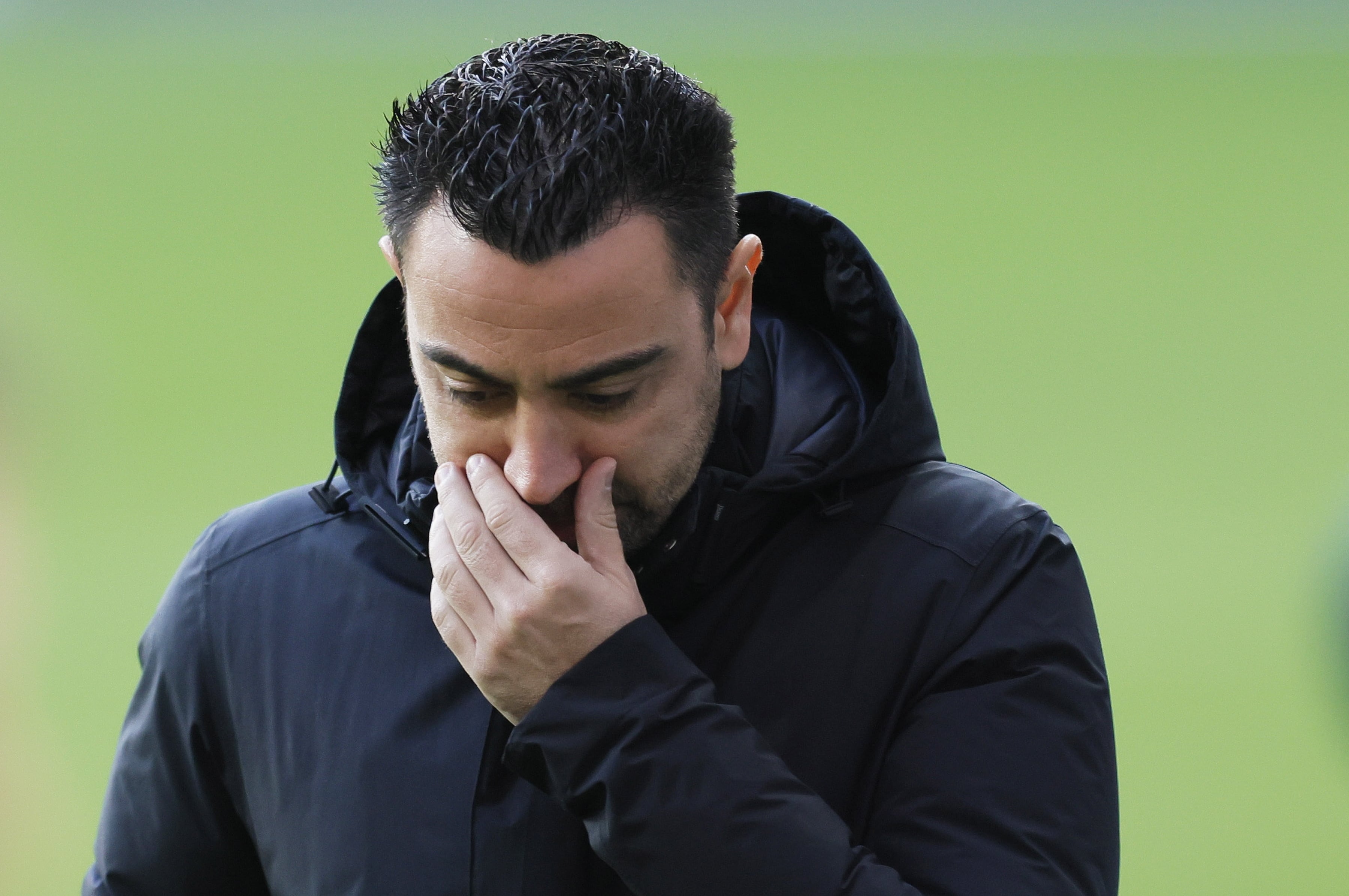 Xavi, cabizbajo, durante un partido de esta temporada