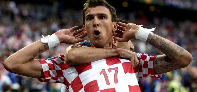 El jugador croata celebra su gol despúes de marcar el 1-1, durante el partido de la ronda preliminar del Grupo C de la Eurocopa 2012, entre Italia y Croacia en Poznan, Polonia hoy, jueves 14 de junio de 2012