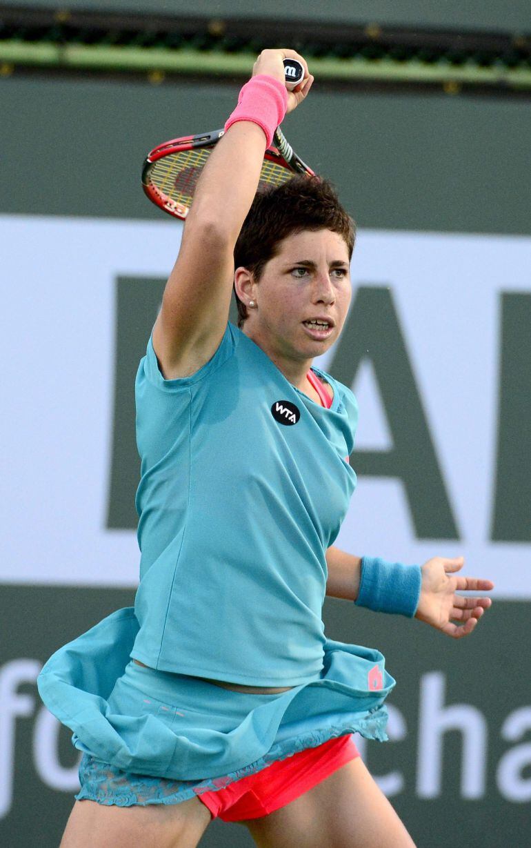 MAN62. Indian Wells (United States), 14/03/2015.- Carla Suarez Navarro of Spain in action against Monica Puig of Puerto Rico during their second round match at the BNP Paribas Open tennis tournament in Indian Wells, California, USA, 13 March 2015. (Tenis, España, Estados Unidos) EFE/EPA/MICHAEL NELSON
