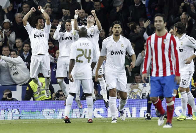 Marcelo, Cristiano y Pepe celebran el tanto del delantero portugués