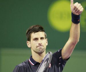 Novak Djokovic of Serbia reacts after wining his match against Dusan Lajovic of Serbia at the Qatar Open tennis tournament in Doha January 6, 2015. REUTERS/Mohammed Dabbous (QATAR - Tags: SPORT TENNIS)