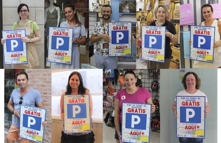 Comerciantes de Dénia con las pegatinas que informan sobre el parking gratuito.