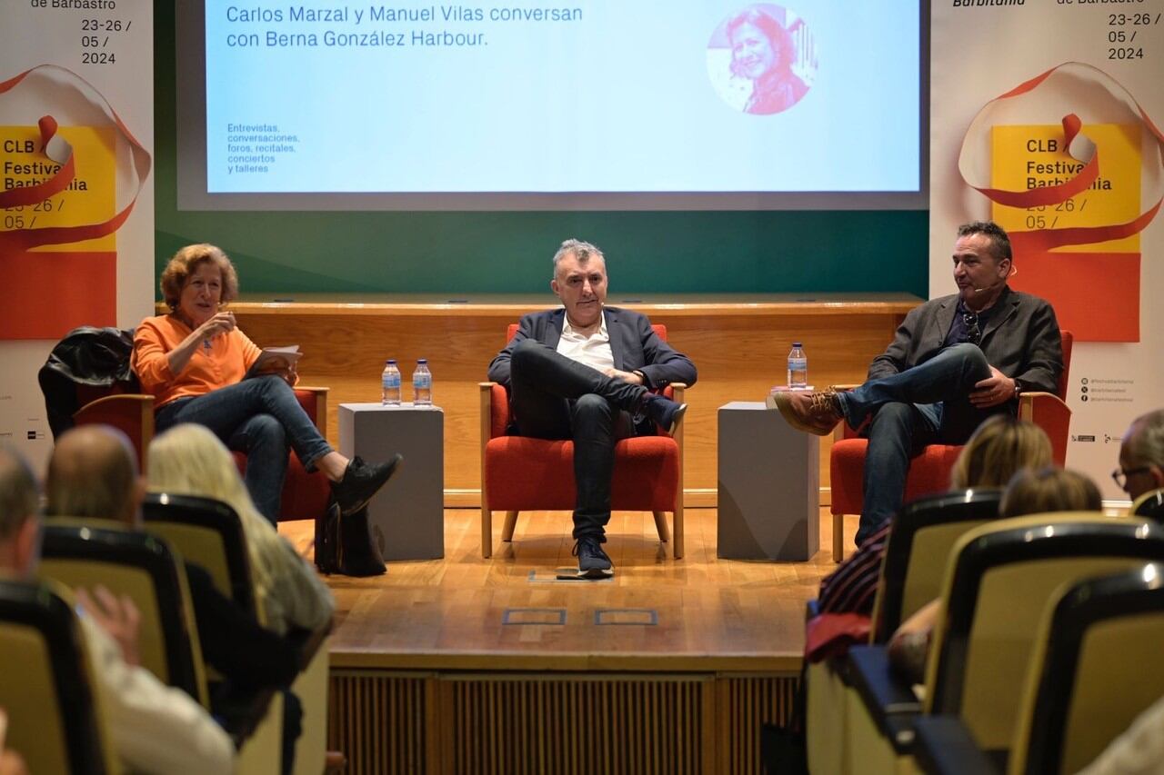 Manuel Vilas y Carlos Marzal conversan con Berna González Harbour en Barbitania, en la edición del año pasado.