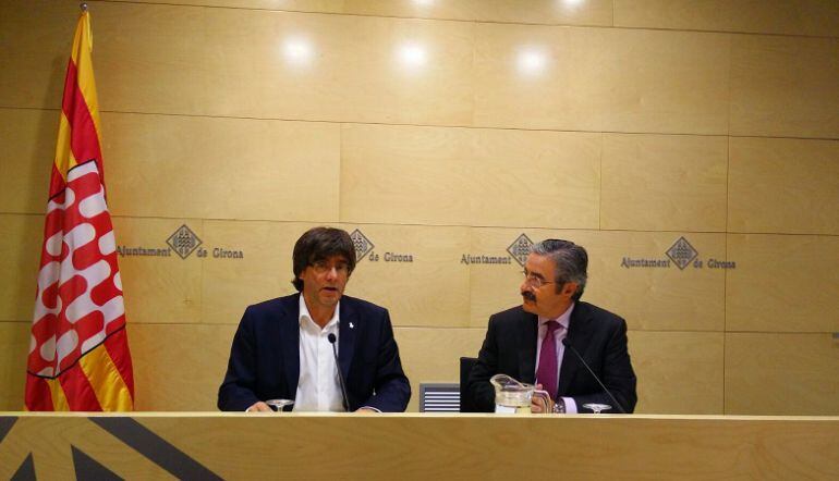 Carles Puigdemont i Kim Faura. 