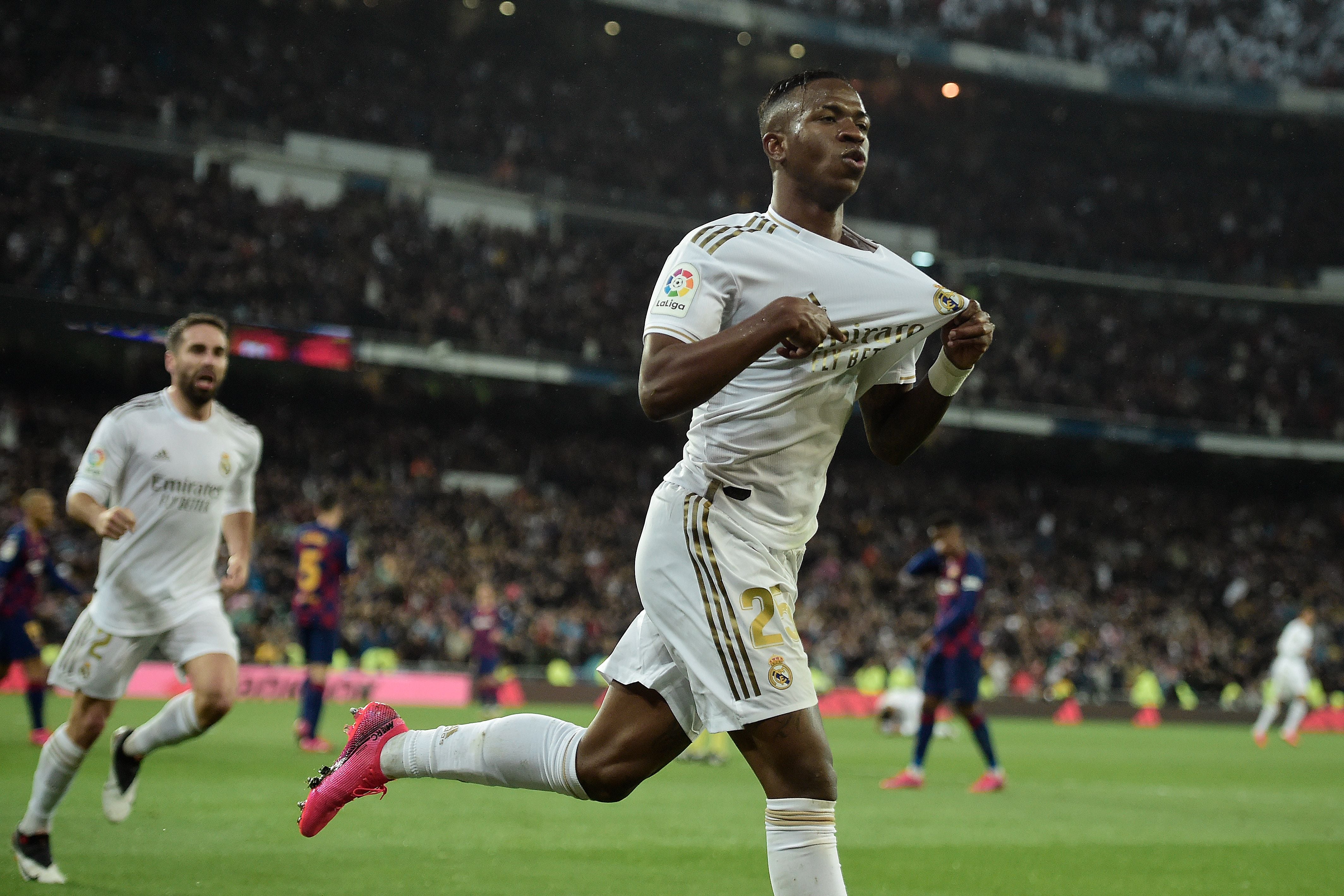 TOPSHOT - Real Madrid&#039;s Brazilian forward Vinicius Junior celebrates a goal during the Spanish League football match between Real Madrid and Barcelona at the Santiago Bernabeu stadium in Madrid on March 1, 2020. (Photo by OSCAR DEL POZO / AFP) (Photo by OSCAR DEL POZO/AFP via Getty Images)