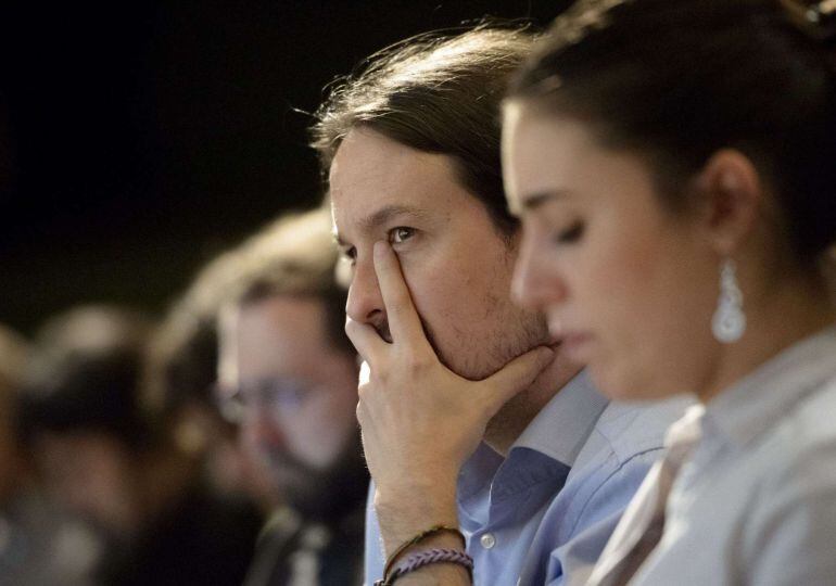 Spain&#039;s anti-austerity party Podemos leader Pablo Iglesias gestures during a press conference held to present a political program in Madrid on May 5, 2015. The surprise resignation on April 30, 2015, of one of the party&#039;s founders, 52-year-old political s