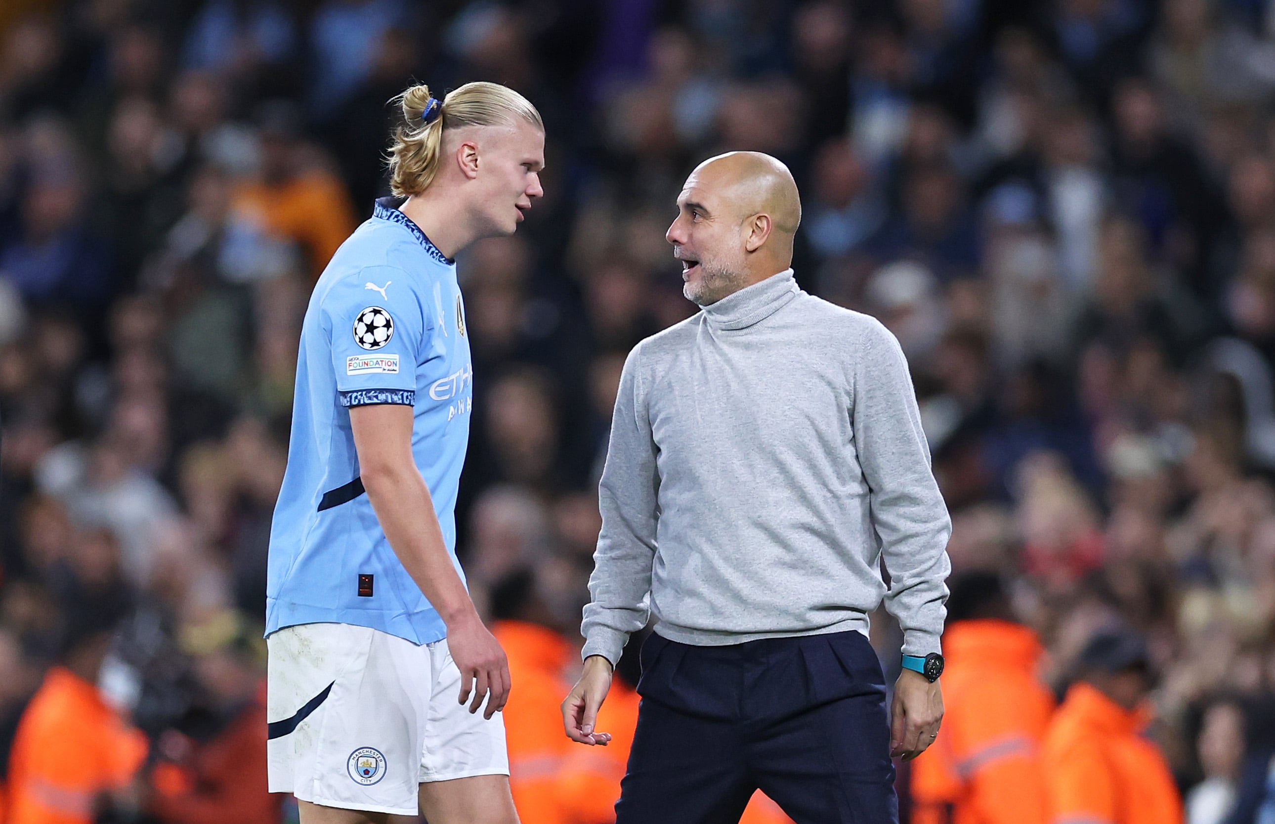 Erlin Haaland y Pep Guardiola