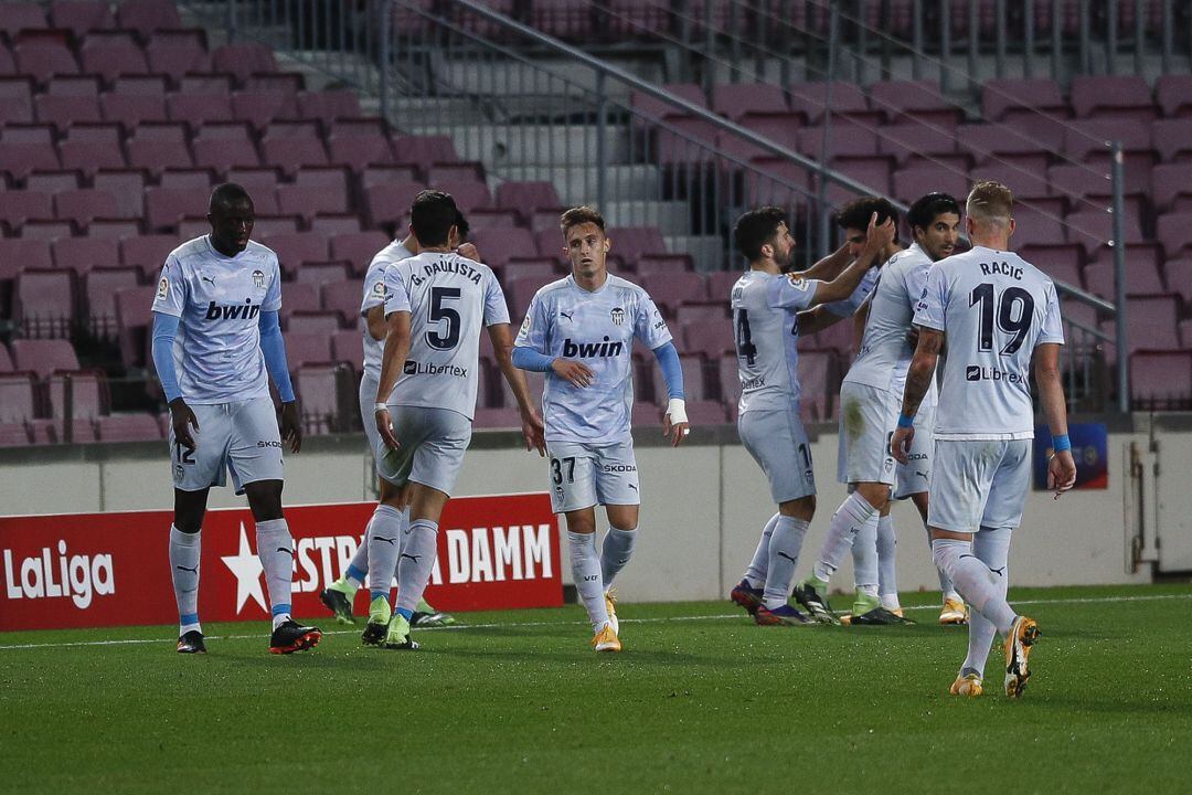 BARCELONA, SPAIN - DECEMBER 19: Maxi Gomez of Valencia CF celebrates scoring his side's 2nd goal during the La Liga Santader match between FC Barcelona and Valencia CF at Camp Nou on December 19, 2020 in Barcelona, Spain. (Photo by Eric Alonso, Getty Images)