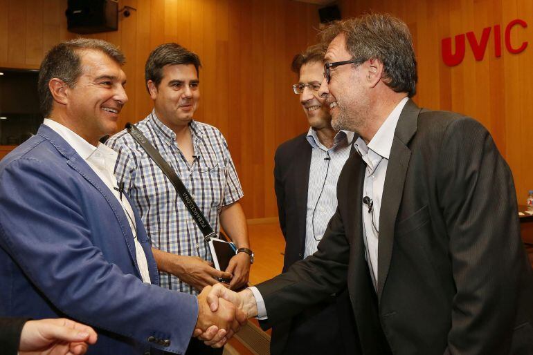 Joan Laporta amb altres candidats a la presidència de l'FC Barcelona (Marc Cornet, Toni Freixa i Agustí Benedito), al debat que han protagonitzat avui a la Universitat de Vic. Laporta farà campanya a Andorra el proper 12 de juliol.