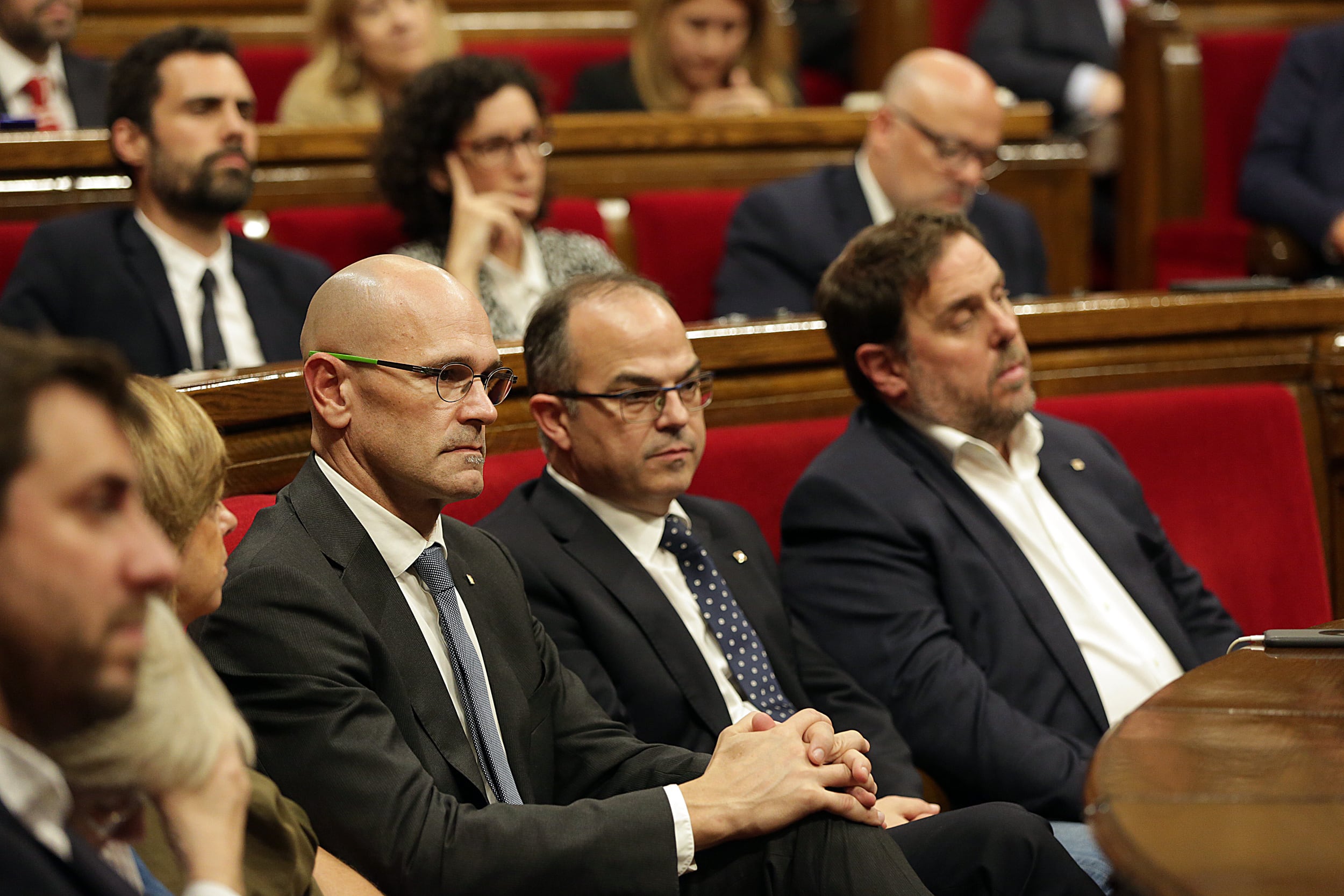 Raül Romeva, Jordi Turull i Oriol Junqueras en el Parlament de Catalunya