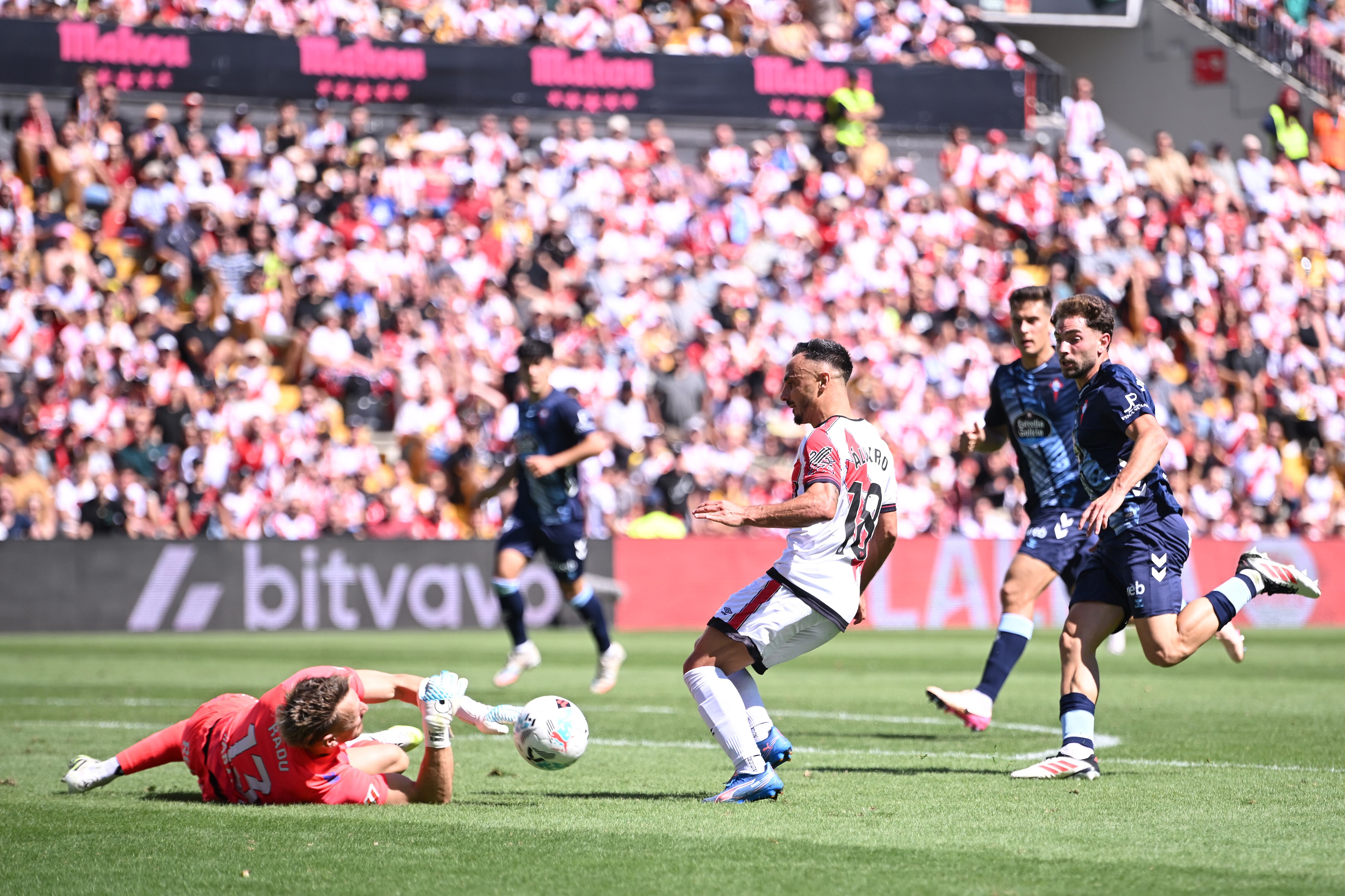 MADRID, SPAIN - SEPTEMBER 21: Andrei Radu of Celta Vigo makes a save from Alvaro Garcia Rivera of Rayo Vallecano during the LaLiga EA Sports match between Rayo Vallecano de Madrid and RC Celta de Vigo at Estadio de Vallecas on September 21, 2025 in Madrid, Spain. (Photo by Denis Doyle/Getty Images)