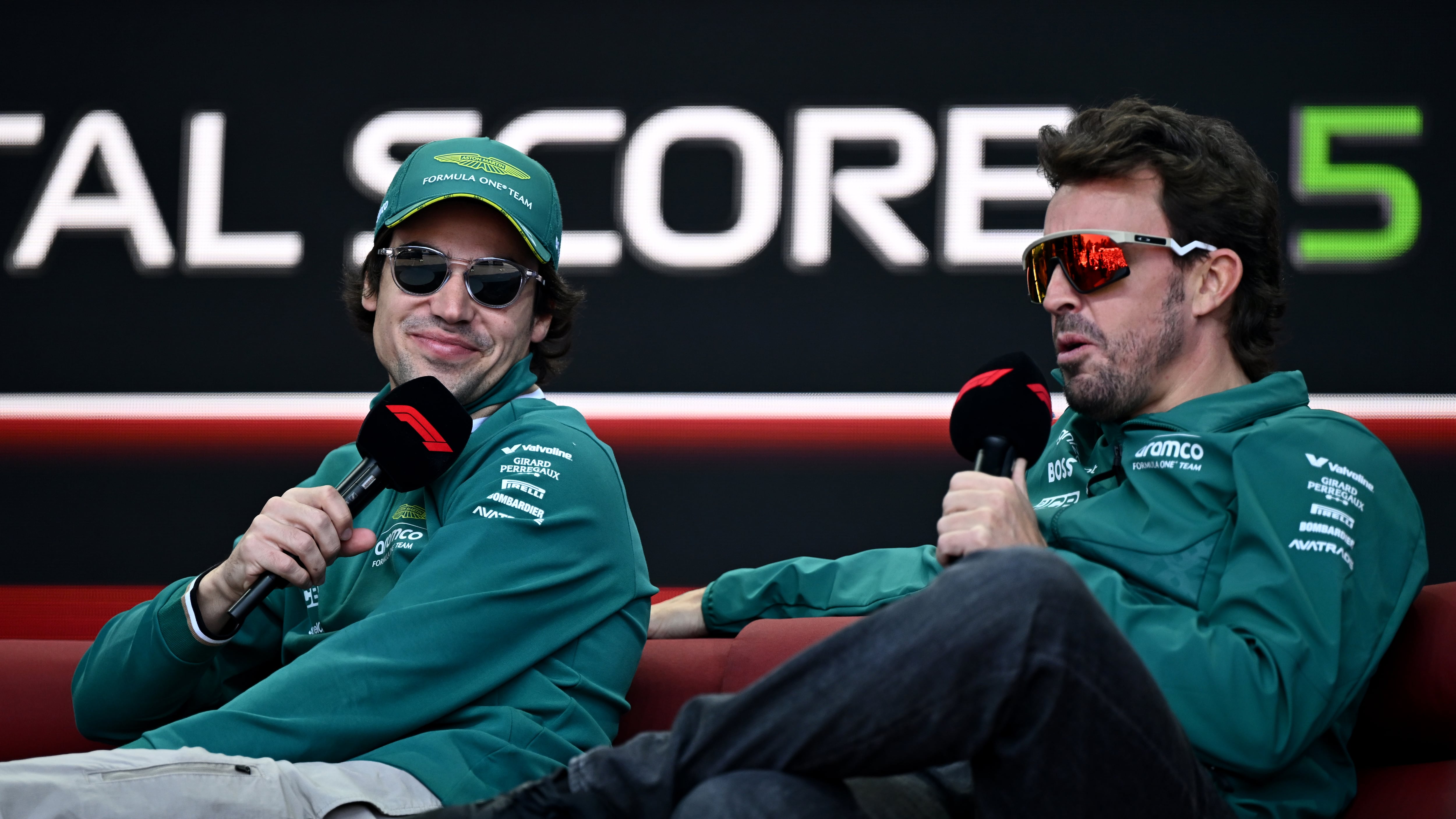 Lance Stroll y Fernando Alonso, durante el GP de Japón