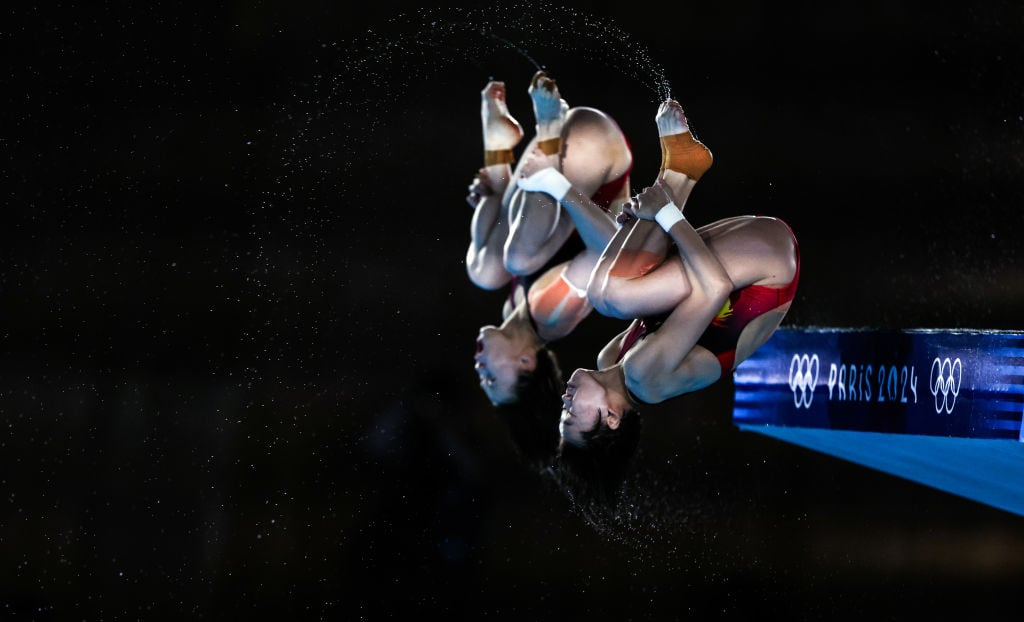 Chen Yuxi y Quan Hongchan, del equipo chino consiguieron el triunfo olímpico en salto desde trampolín en parejas.