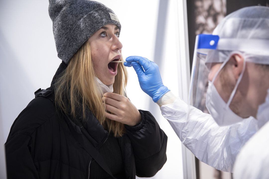 A medical worker takes a Covid-19