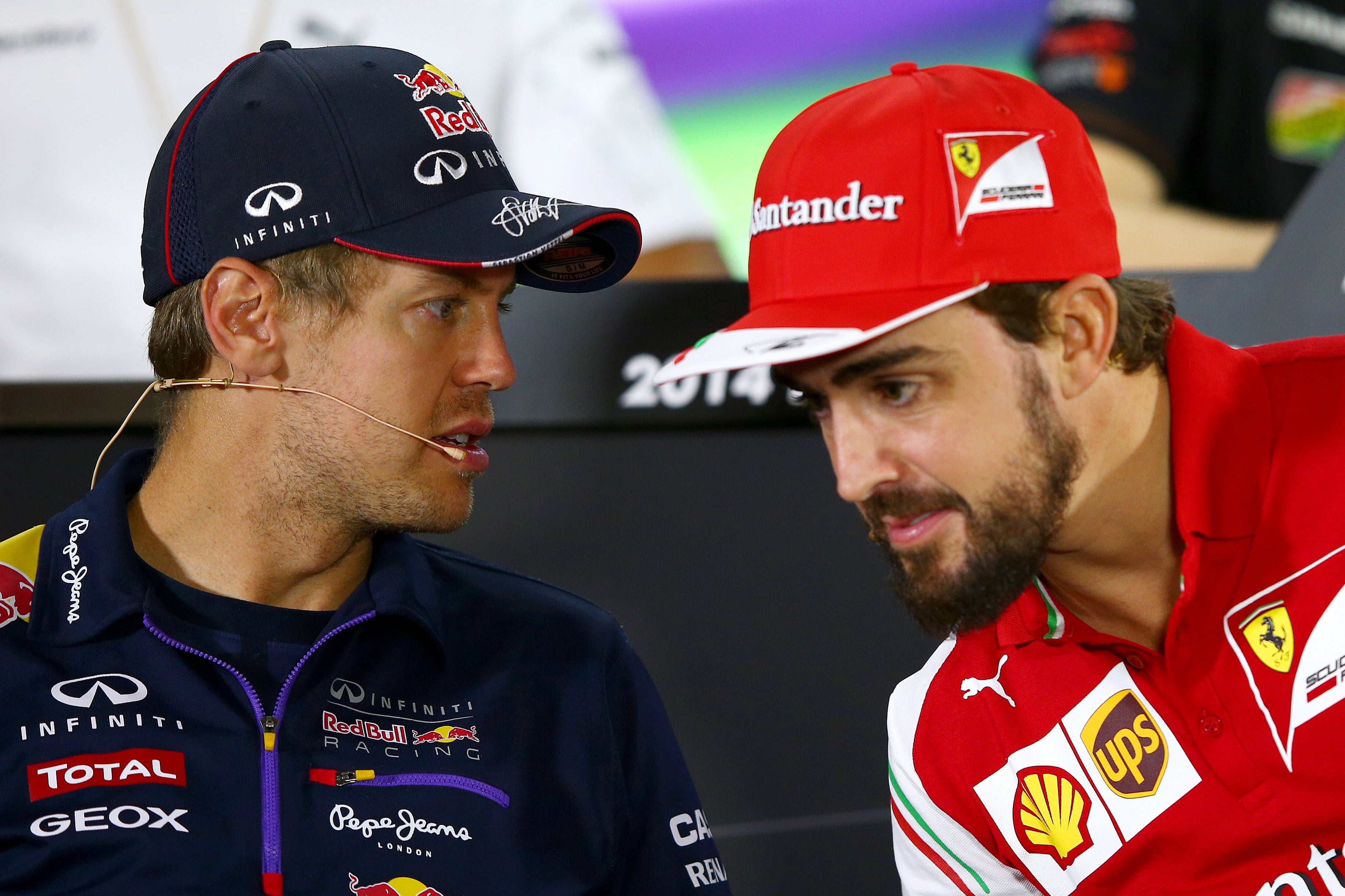 Fernando Alonso y Sebastian Vettel, durante una rueda de prensa en 2014