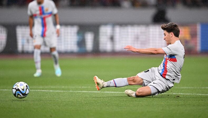 Barcelona&#039;s Spanish midfielder Pablo Torre takes a shot during the football friendly between Japan&#039;s Vissel Kobe and Spanish side Barcelona at the Japan National Stadium in Tokyo on June 6, 2023. (Photo by Yuichi YAMAZAKI / AFP) (Photo by YUICHI YAMAZAKI/AFP via Getty Images)