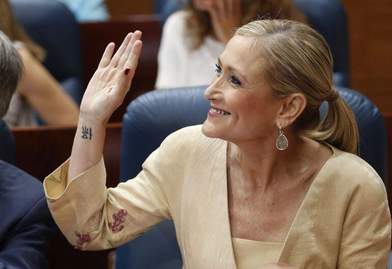 GRA112. MADRID, 23/06/2015.- La candidata del PP a la Presidencia de la Comunidad de Madrid, Cristina Cifuentes, presenta su programa de gobierno en la primera jornada del pleno de investidura para la que cuenta con el apoyo de Ciudadanos. EFE/Paco Campos