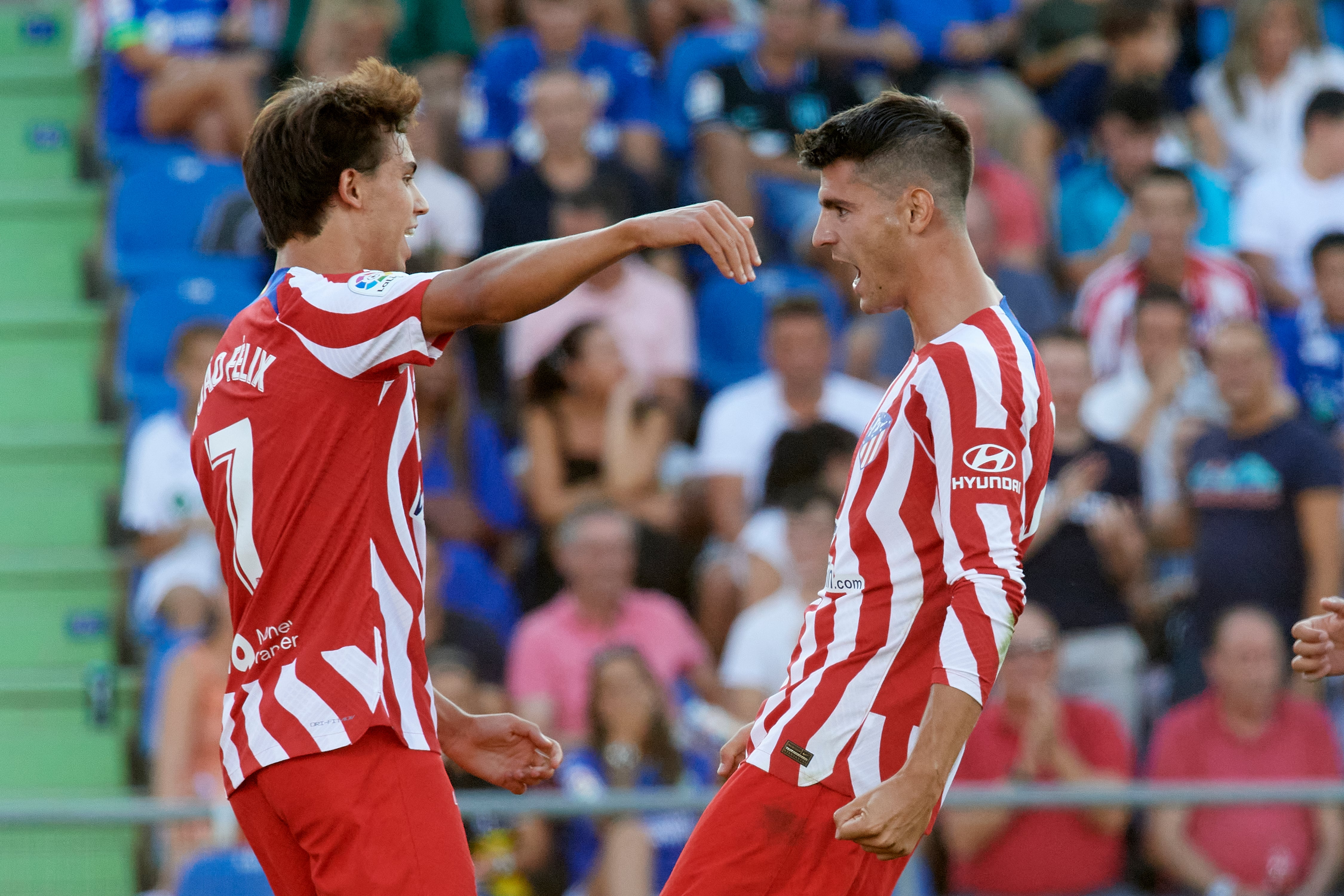 Morata y Joao Félix celebran el segundo gol.