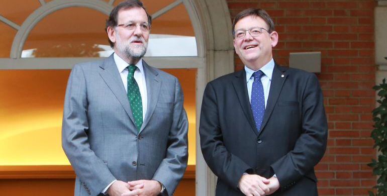 Mariano Rajoy y Ximo Puig en la puerta de La Moncloa