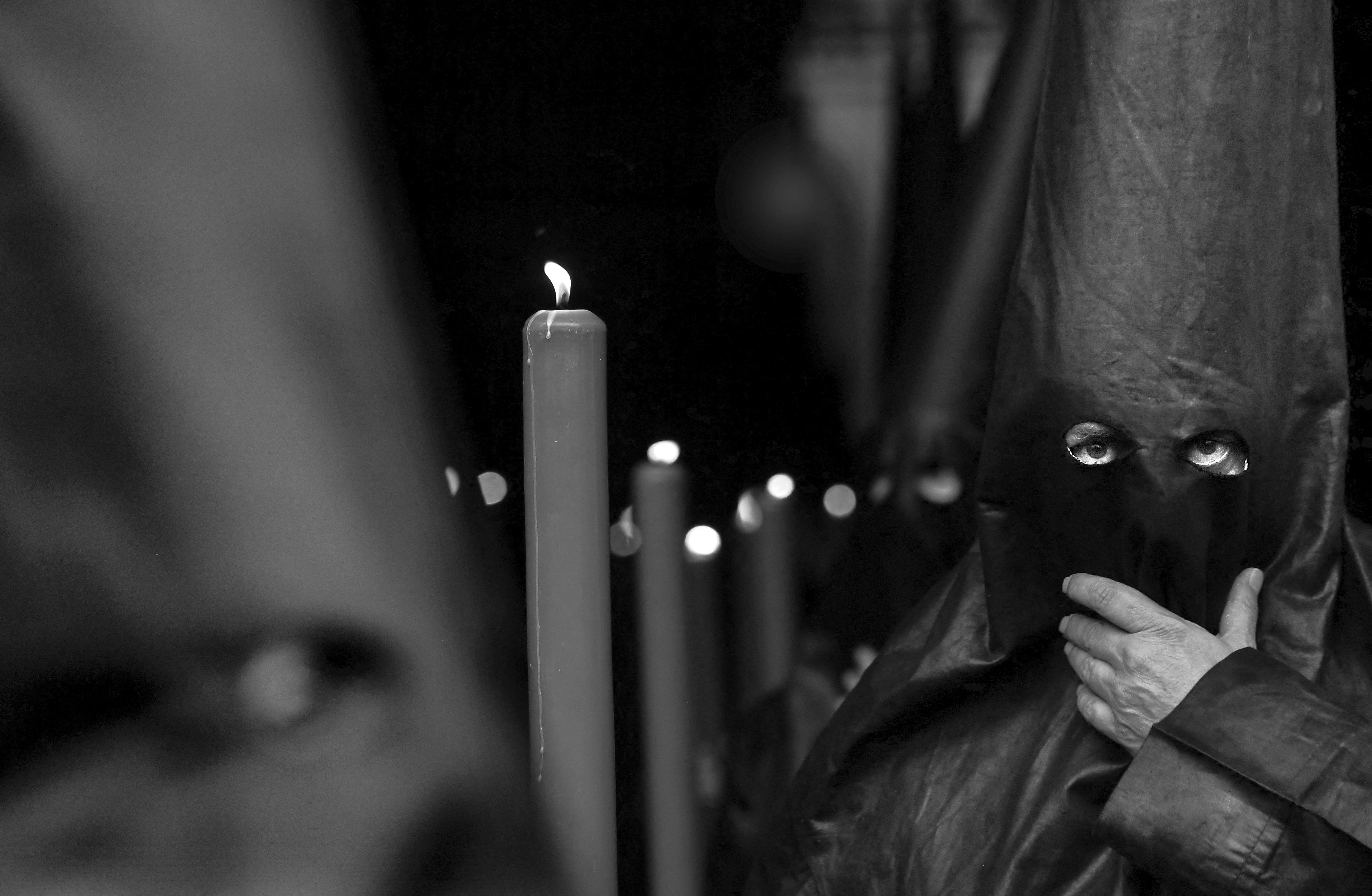 Penitents of Los Estudiantes brotherhood take part in the Holy Tuesday procession in Seville on April 4, 2023. - AFP presents a photo essay of 43 pictures taken between April 2 and April 7, 2023, showing Spain&#039;s colourful Semana Santa (Holy Week) celebrations, featuring centuries-old processions of the faithful carrying flower-covered floats topped with statues of Christ or the Virgin Mary.More images can be found on www.afpforum.com
Search SLUG : SPAIN-RELIGION-EASTER-TRADITION (Photo by Cristina Quicler / AFP) (Photo by CRISTINA QUICLER/AFP via Getty Images)