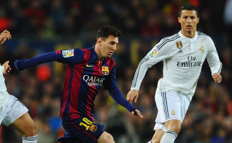 Cristiano y Messi durante un Clásico