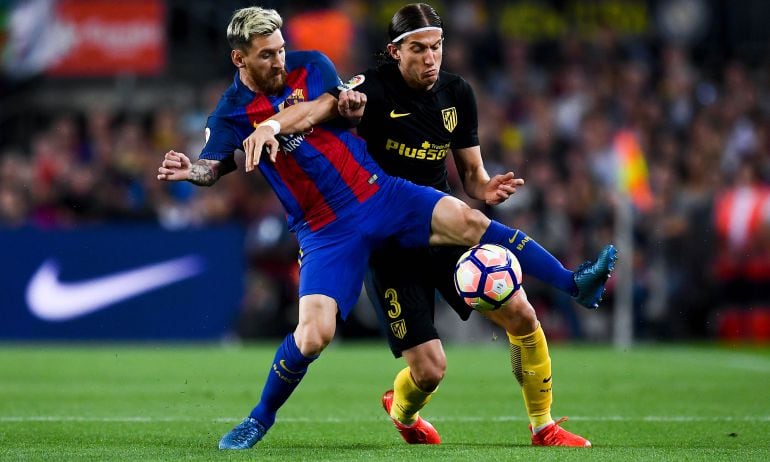 Messi y Filipe Luis, en el último choque de la Liga entre Barcelona y Atlético (1-1).