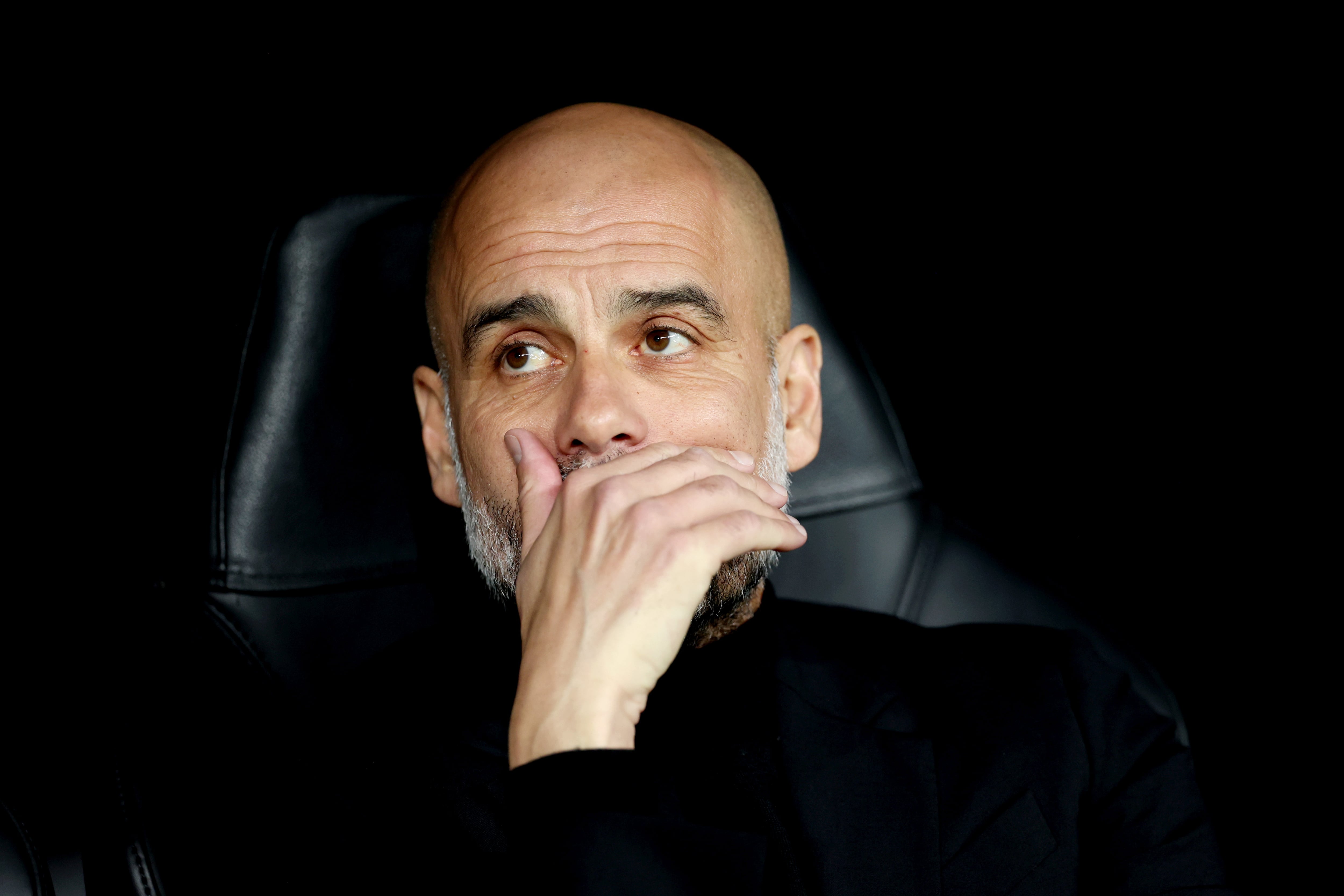 Pep Guardiola, en el banquillo del Santiago Bernabéu, durante el partido de Champions League entre Real Madrid y Manchester City