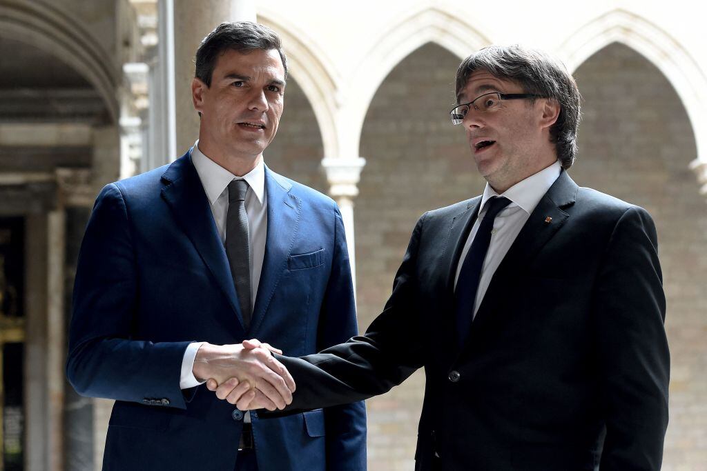 Pedro Sánchez y Carles Puigdemont, durante un encuentro.