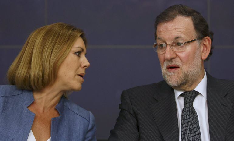 Mariano Rajoy, junto a la secretaria general del PP, María Dolores de Cospedal