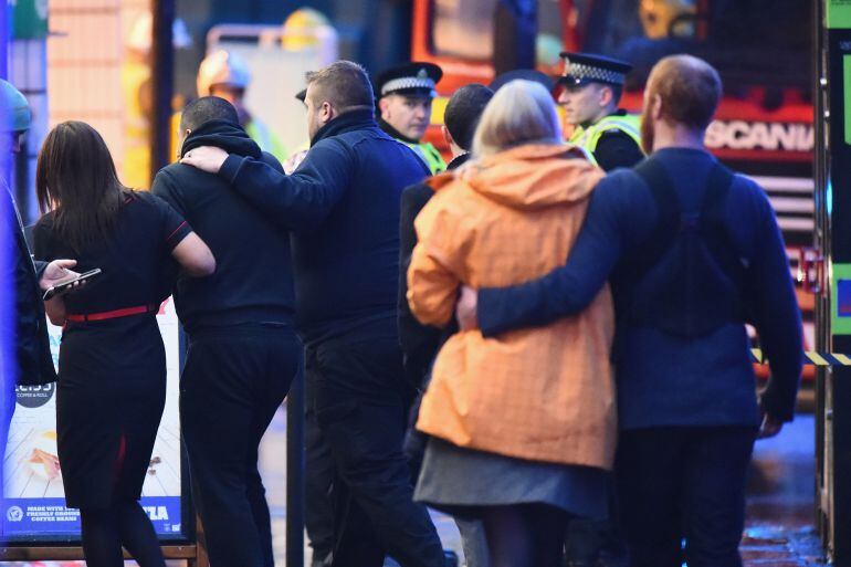 GLASGOW, SCOTLAND - DECEMBER 22:  Emergency services attend the scene of the crash in George Square on December 22, 2014 in Glasgow, Scotland. There are reports of a number of fatalities and substantial casualties after a bin lorry appears to have crashed