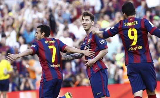 Barcelona&#039;s forward Pedro Rodriguez (L) celebrates with teammate Barcelona&#039;s Argentinian forward Lionel Messi (C) after scoring during the Spanish league football match FC Barcelona vs Real Sociedad de Futbol at the Camp Nou stadium in Barcelona on May 9,