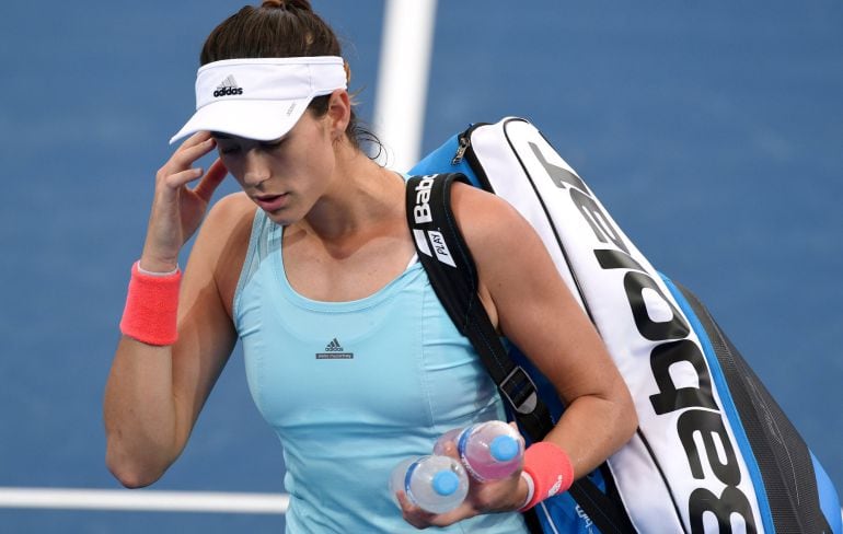 Muguruza se marcha de la central de Brisbane tras caer lesionada